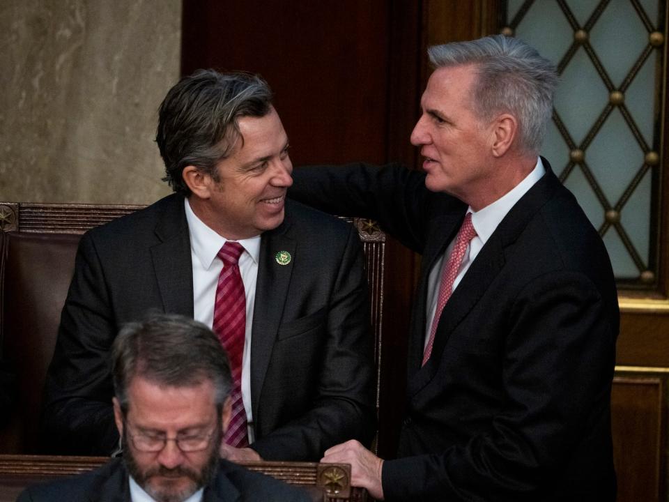 Ogles talks with Kevin McCarthy during the 3rd day of votes for speaker of the House.