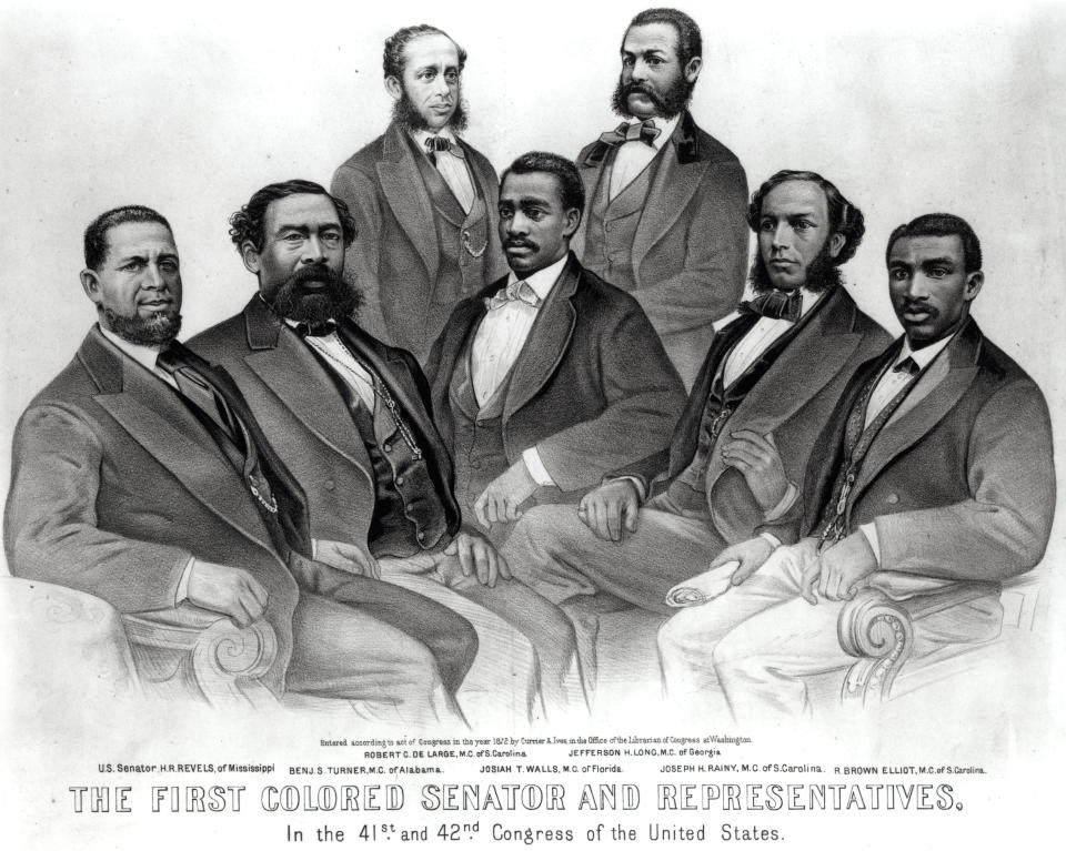 The First Colored Senator and Representatives, in the 41st and 42nd Congress of the US. Top standing left to right: Robert C. De Large, M.C. of S. Carolina; and Jefferson H. Long, M.C. of Georgia. Seated, left to right: U.S. Senator H.R. Revels of Mississippi; Benj. S. Turner, M.C. of Alabama; Josiah T. Walls, M.C. of Florida; Joseph H. Rainy, M.C. of S. Carolina; and R. Brown Elliot, M.C. of S. Carolina. Lithograph by Currier and Ives, 1872.