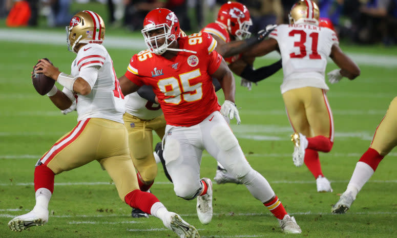 Kansas City Chiefs tackle Chris Jones chases Jimmy Garoppolo.