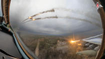 FILE – A Su-25 plane is seen firing rockets over Ukraine in a video frame grab. The video was taken from inside another Su-25 plane and released by the Russian Defense Ministry on Jan. 22, 2024. (Russian Defense Ministry Press Service via AP, File)