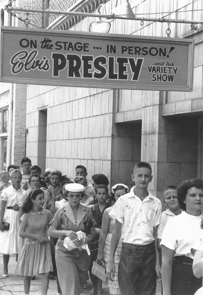 A line of eager fans waits to be allowed into the Florida Theatre to see one of the shows that Elvis put on in Jacksonville over the course of two days in August 1956.