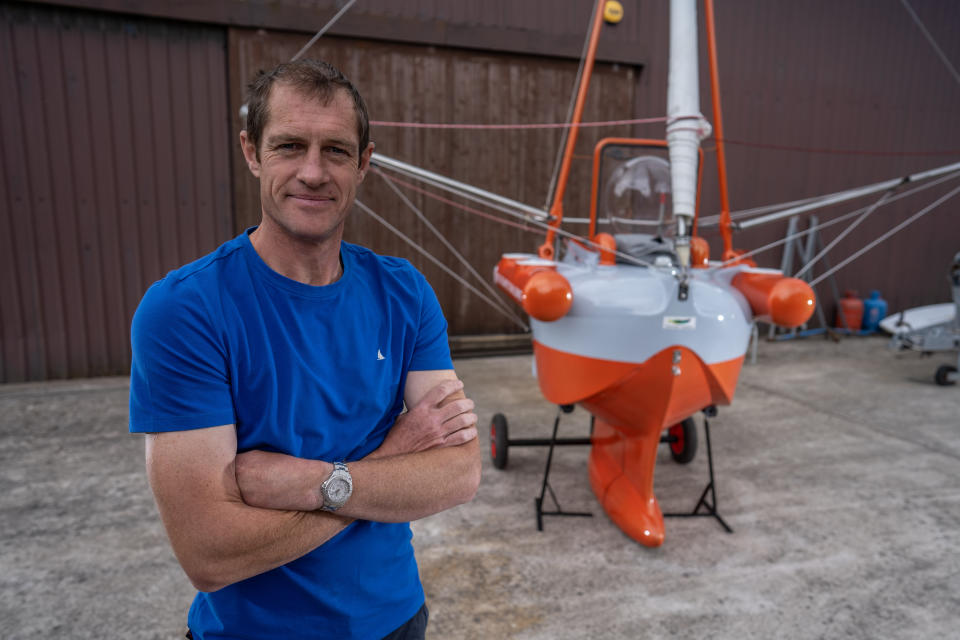 Andrew Bedwell, of Lancashire, who is planning to smash the record for sailing the smallest boat to cross the Atlantic, Big C which is just over 1m/3.2ft long.  See SWNS story SWLEboat. A dare-devil dad hopes to break a world record by sailing 1,900 miles across the Atlantic Ocean - in his self-built boat that's just ONE METRE long. Andrew Bedwell, 48, who will set off from Newfoundland, Canada, in May next year, compared the journey to being â€œstuck in a wheelie bin, on a rollercoaster for 90 daysâ€. The mariner came up with the idea after reading a book by current record holder Hugo Vihlen, who made the perilous passage in a 1.6m (5ft 4inch) boat 30 years ago. His fibreglass boat - which is half a metre shorter and has a top speed of 2.5mph - is a modified version of a ship that another ex-record holder, Tom McNally, designed. 