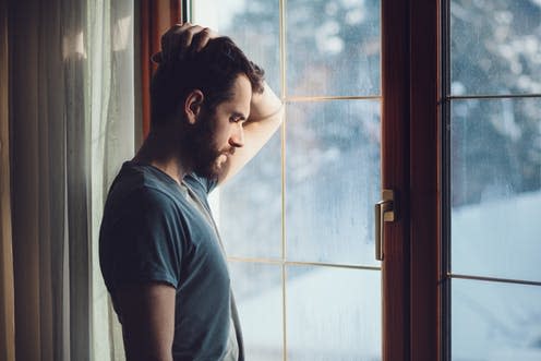 <span class="caption">Bisexual men suffer disproportionately more from mental health than others – largely due to social attitudes.</span> <span class="attribution"><a class="link " href="https://www.shutterstock.com/image-photo/young-sad-mad-sitting-by-window-558962893?src=library" rel="nofollow noopener" target="_blank" data-ylk="slk:Marjan Apostolovic/Shutterstock.com;elm:context_link;itc:0;sec:content-canvas">Marjan Apostolovic/Shutterstock.com</a></span>