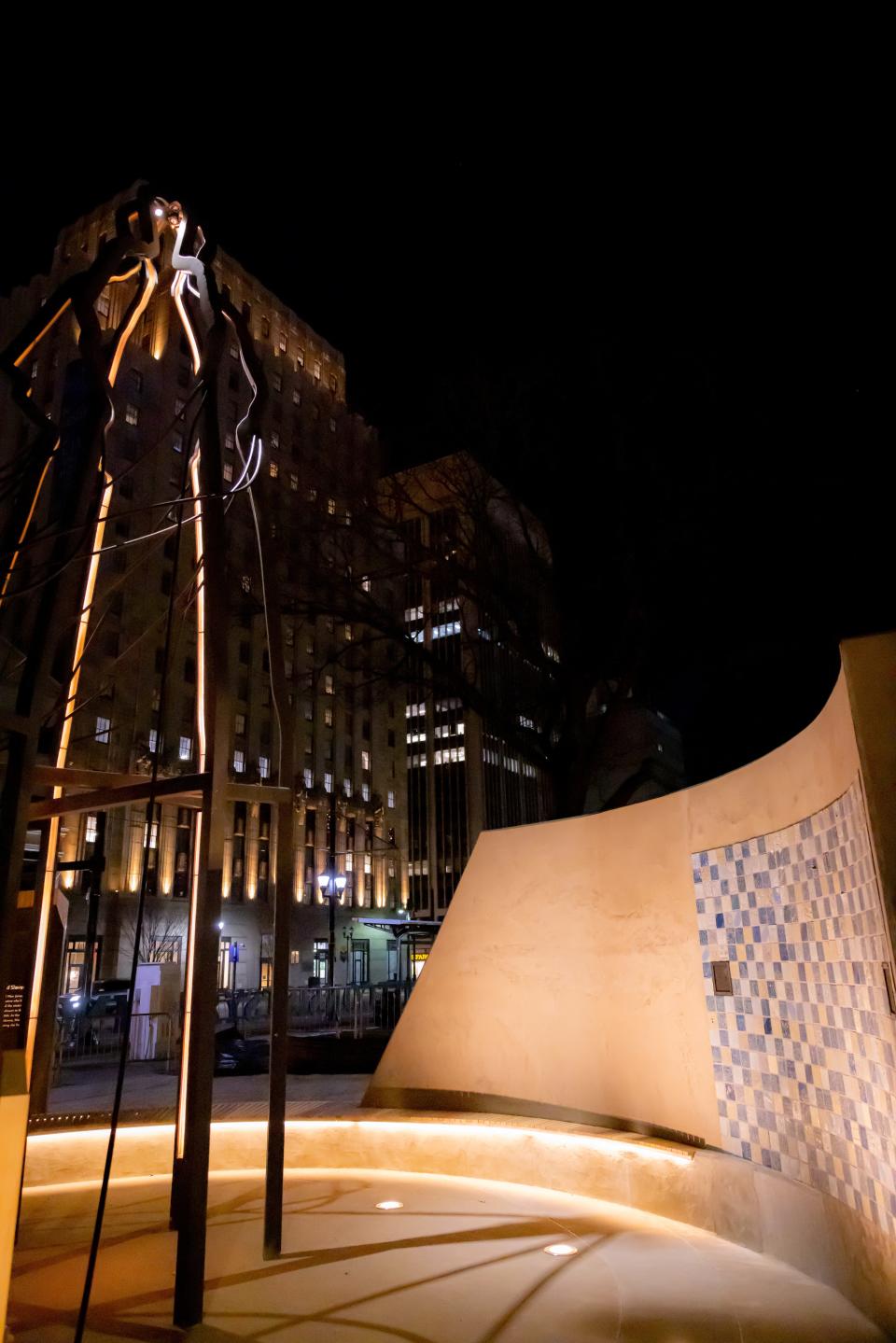 A Harriet Tubman monument, "Shadow of a Face," in Harriet Tubman Square in Newark, is a towering wood and metal construction, with an image of the famous underground railroad conductor on its round, winding base.