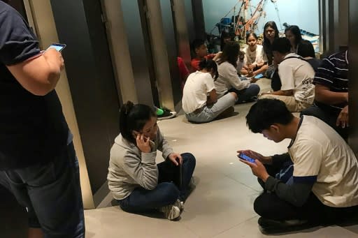 Chanathip Somsakul took this photo showing those trapped inside the mall