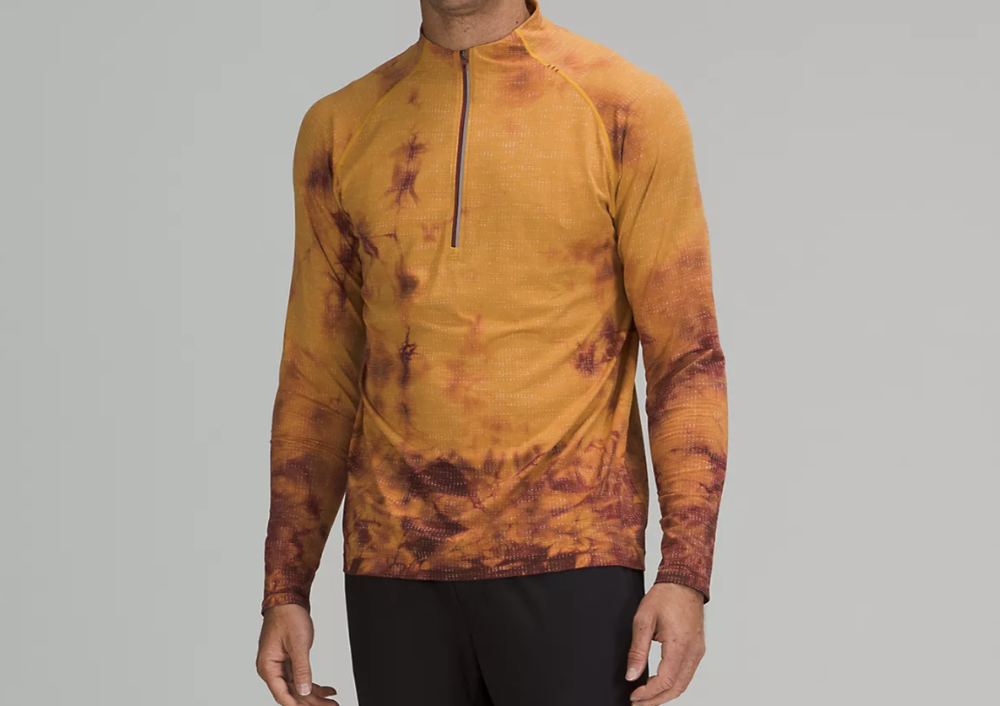 Lululemon half-zip shirt in mustard color.