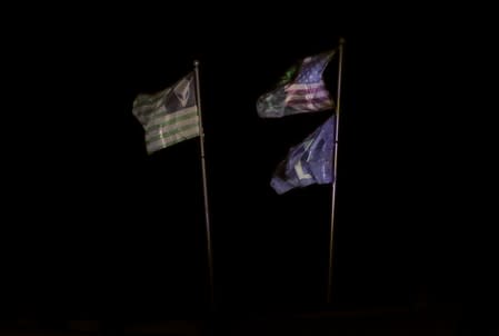 Alien flags are flown over a camp as an influx of tourists responding to a call to 'storm' Area 51, a secretive U.S. military base believed by UFO enthusiasts to hold government secrets about extra-terrestrials, is expected in Rachel, Nevada