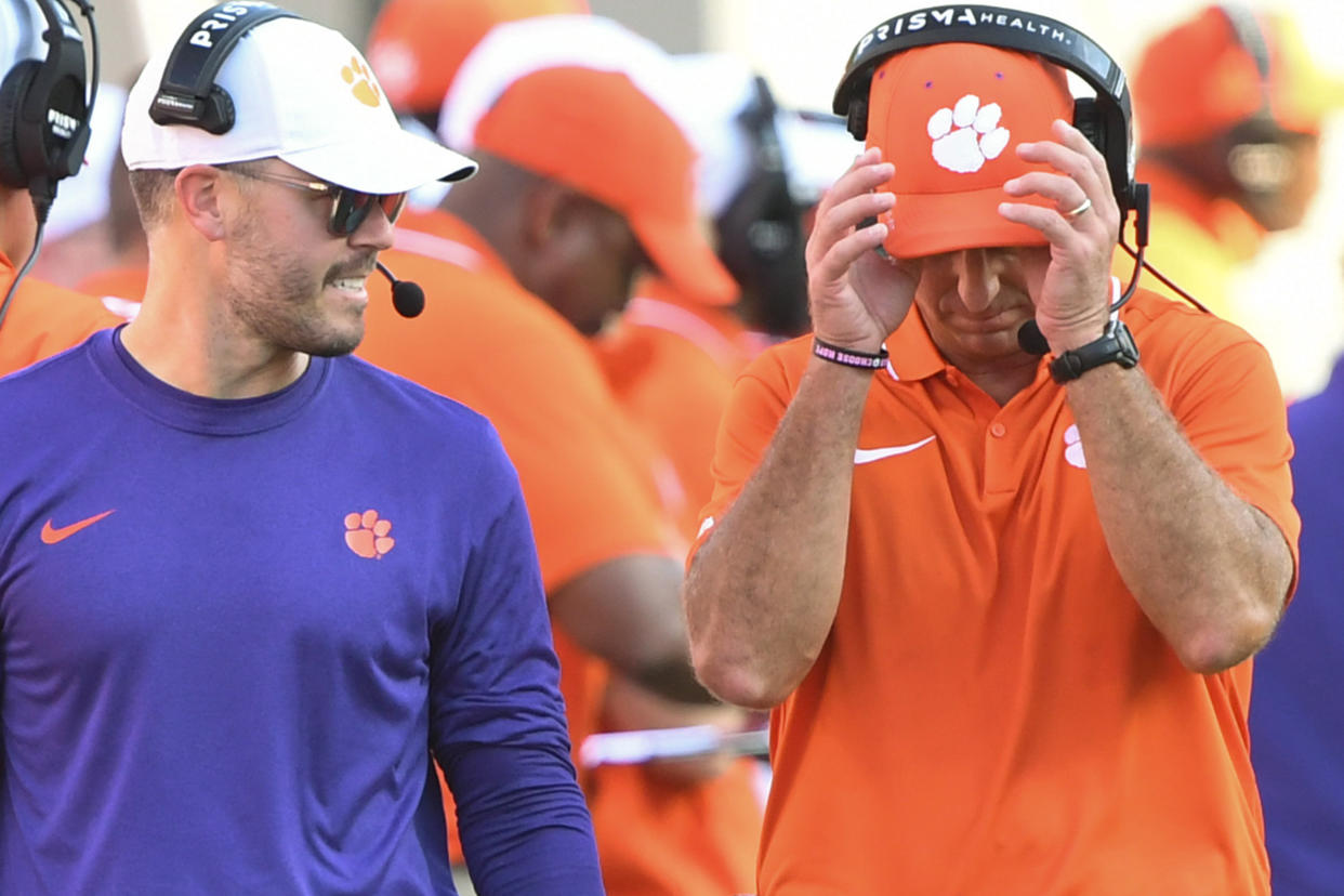 Clemson Tigers coach Dabo Swinney and offensive coordinator Garrett Riley react during their loss to NC State. (Ken Ruinard-USA TODAY Sports)