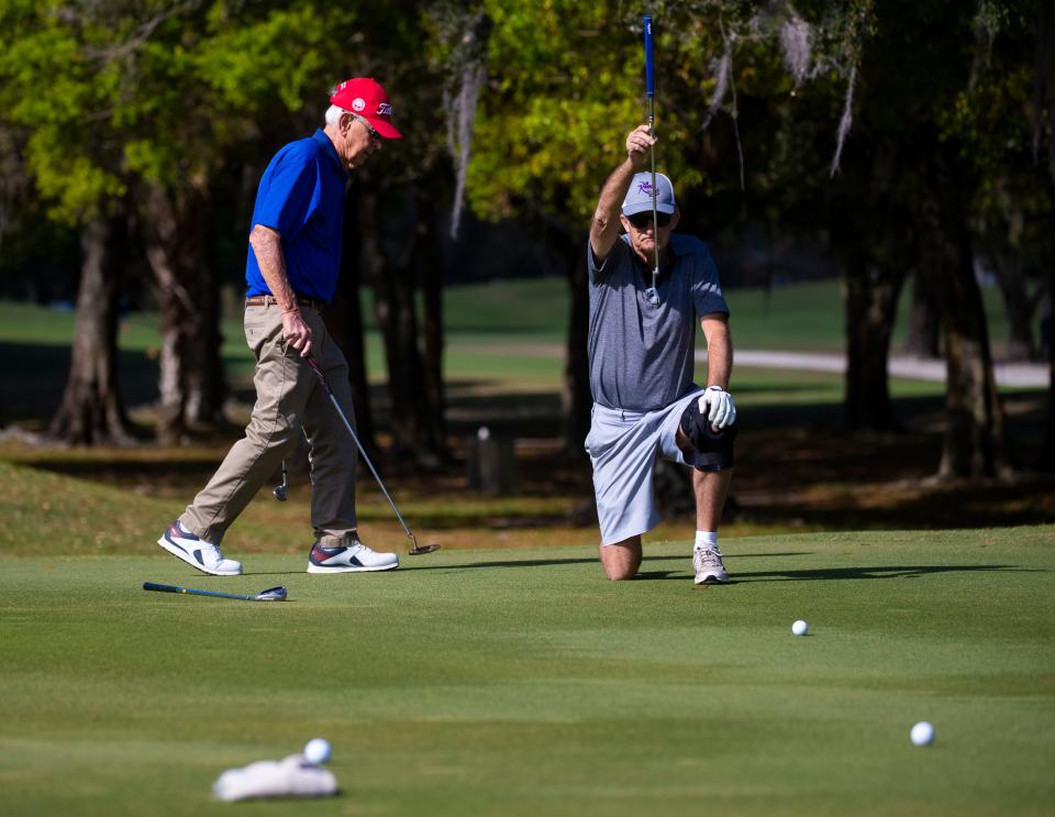 Cape Coral resident John Seaman prepares to make a putt Wednesday morning, January 12, 2022 at Coral Oaks Golf Course.