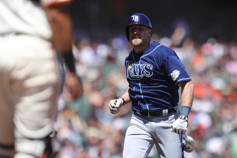 Tampa Bay Rays first baseman Luke Raley (55) hits an inside the park home run during the sixth inning against the San Francisco Giants at Oracle Park.