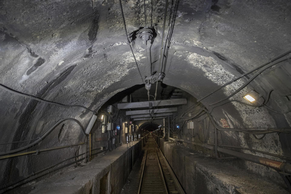 FILE - This Oct. 17, 2018 file photo shows damage to the Hudson River rail tunnel in New York. The news that Amtrak is working with federal officials to do extensive repairs to its Hudson River rail tunnel while a plan to build a new tunnel languishes raises the specter of more delays for already beleaguered commuters. Transportation Secretary Elaine Chao told a House subcommittee Thursday, Feb. 27, 2020, that the work needs to happen now instead of waiting for a new tunnel to be built, (Pool Photo/Victor J. Blue/The New York Times via AP)