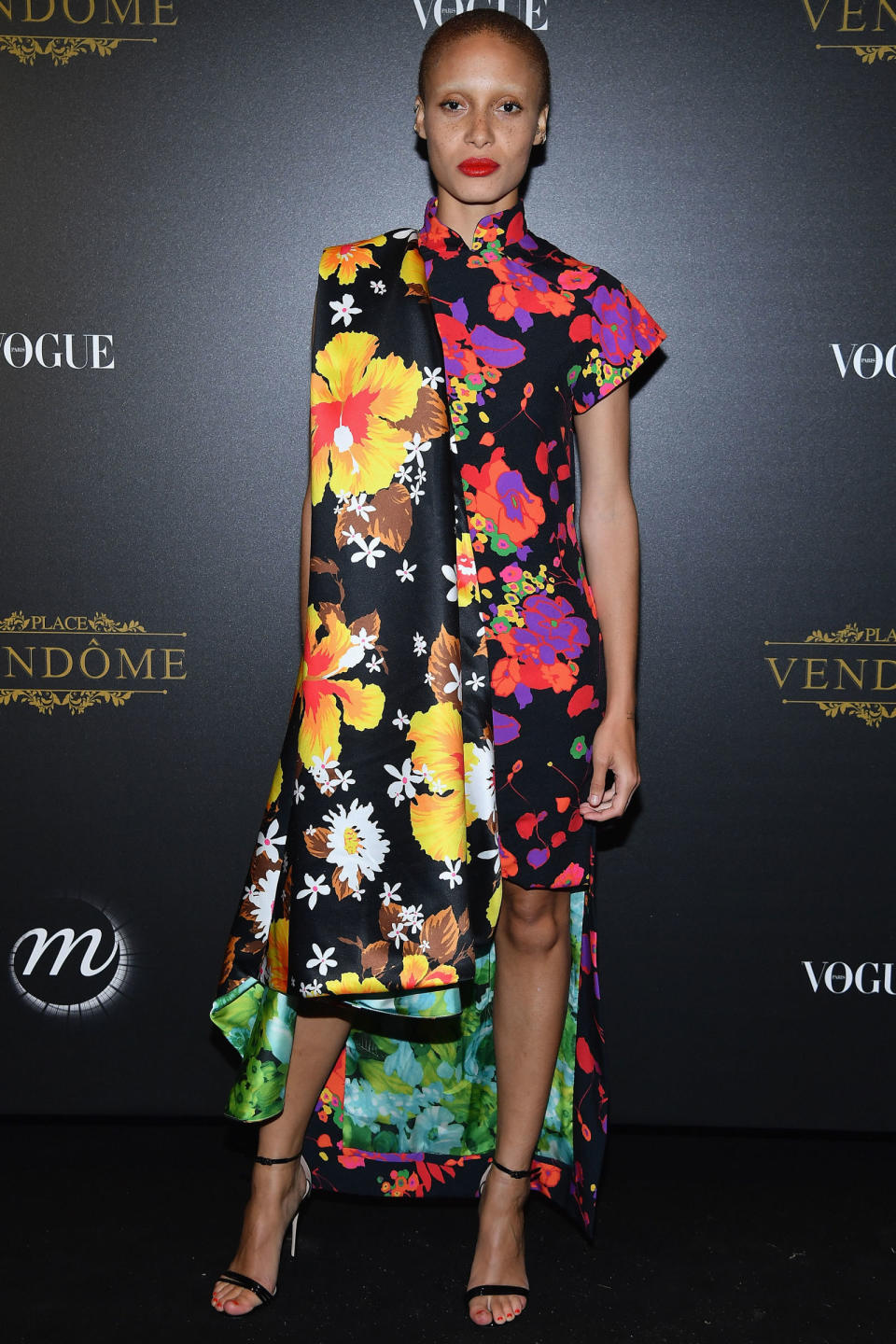 <p><strong>1 October</strong> Adwoa Aboah paired a vibrant floral Richard Quinn dress with bright red lipstick for the party. </p>
