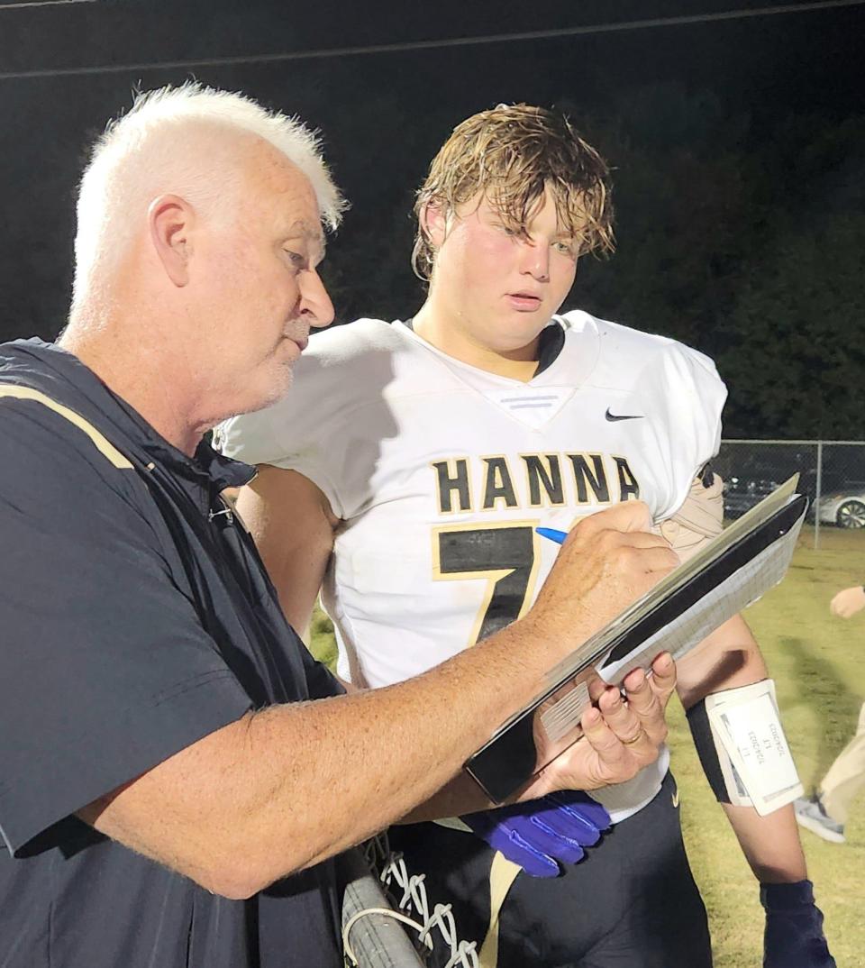 T.L. Hanna offensive lineman Chase Gregorek gets some halftime instructions.