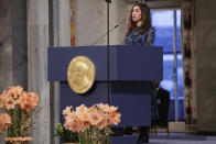 The Peace Prize laureate Nadia Murad from Iraq, gives a speech during the Nobel Peace Prize Ceremony in Oslo Town Hall, Oslo, Monday Dec. 10, 2018. Dr. Denis Mukwege of Congo and Nadia Murad of Iraq jointly receive the Nobel Peace Prize recognising their efforts to end the use of sexual violence as a weapon of war and armed conflict. (Haakon Mosvold Larsen / NTB scanpix via AP, Pool)