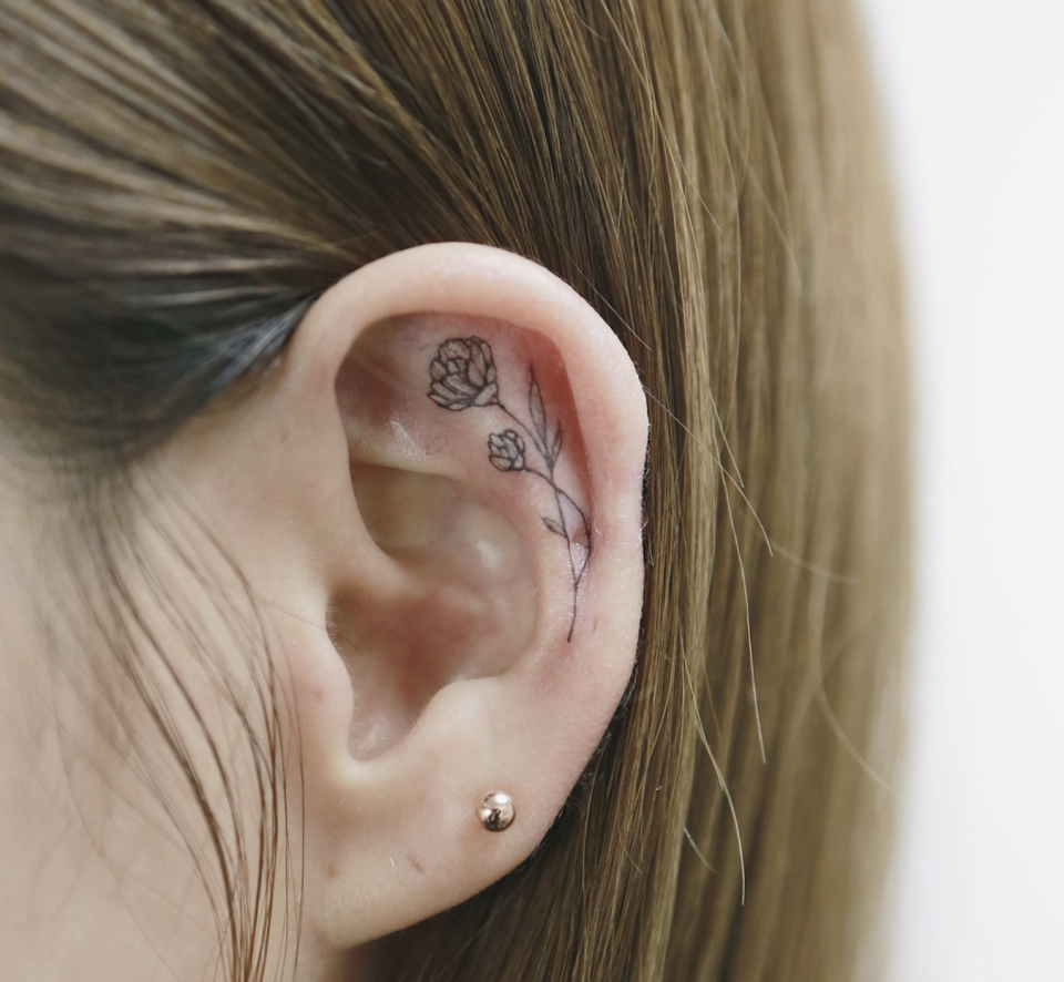 Okay, so we’re completely crushing over these floral ear tats