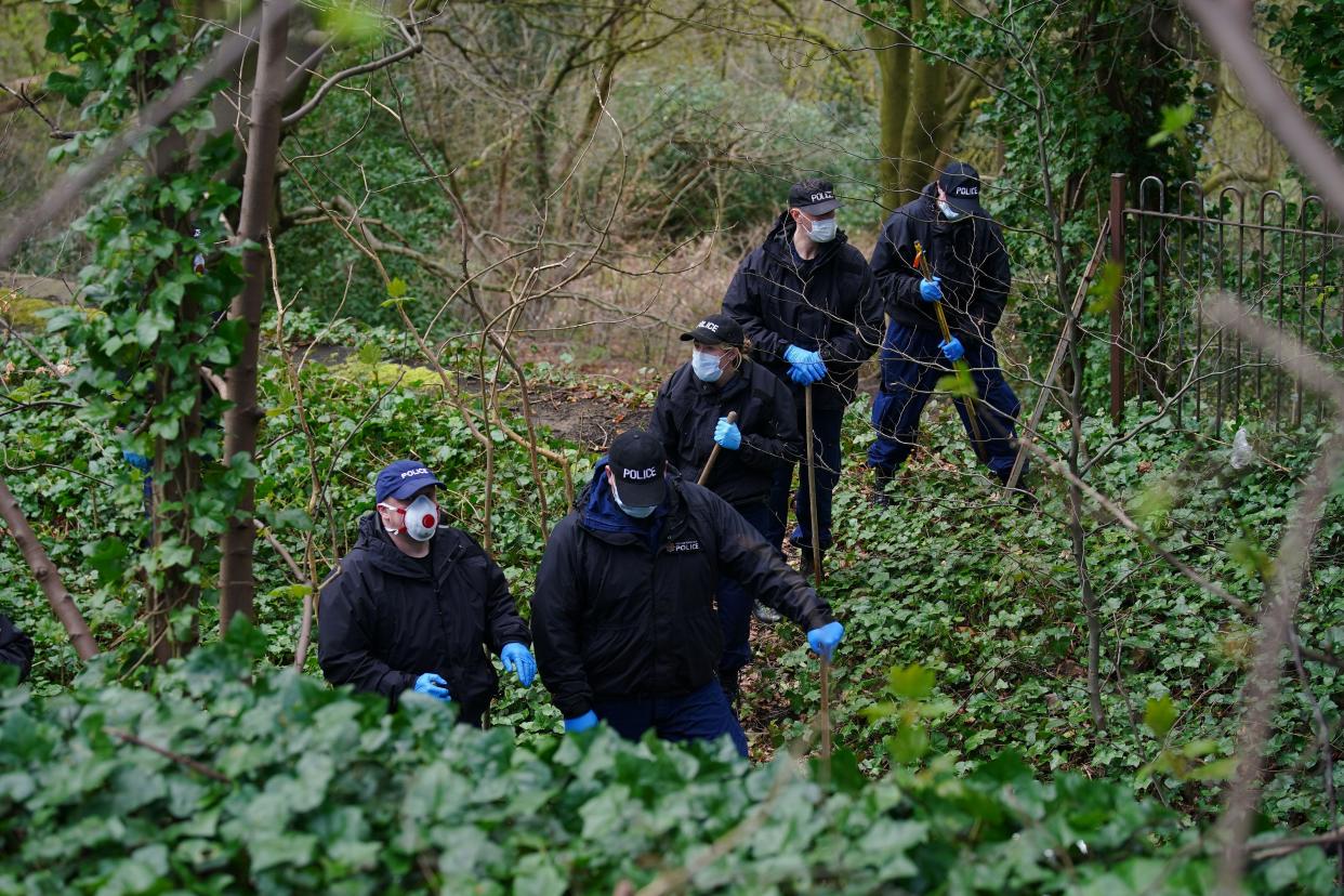 Police officers carry out searches at Kersal Dale, near Salford, Greater Manchester, where a major investigation has been launched after human remains were found on Thursday evening. Greater Manchester Police (GMP) said officers were called by a member of the public who found an 