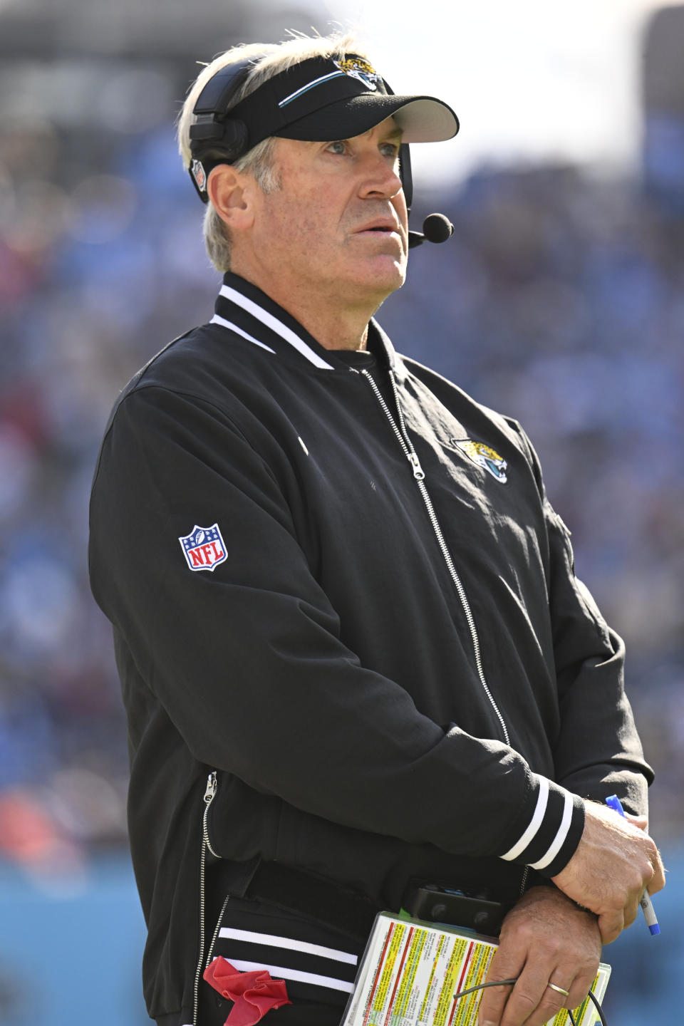 Jacksonville Jaguars head coach Doug Pederson watches the action during the first half of an NFL football game against the Tennessee Titans Sunday, Jan. 7, 2024, in Nashville, Tenn. (AP Photo/John Amis)