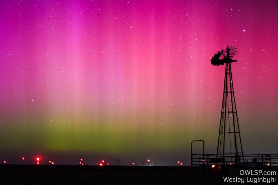 The aurora borealis is visible in the rural, northern Texas Panhandle on Sunday evening.