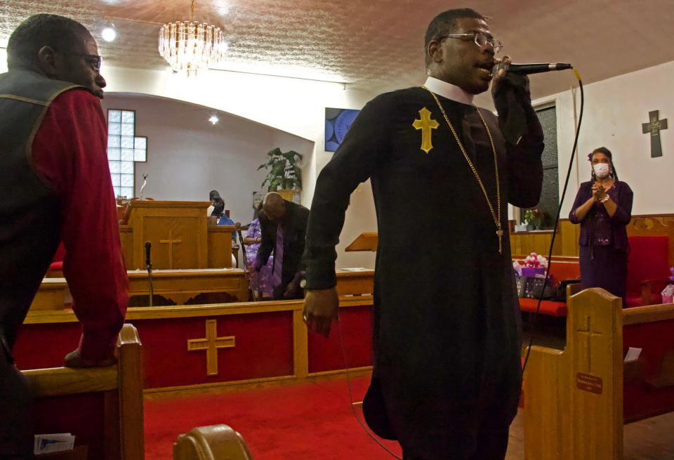 Bishop Timothy Green delivers the sermon at Pilgrim Rest Church of God In Unity in northeast Gainesville on Sunday during a service celebrating the second anniversary of Pastor Gwendolyn Williams as pastor of the church. Green is pastor of Cohen Temple First Born Church of the Living God in northeast Gainesville.