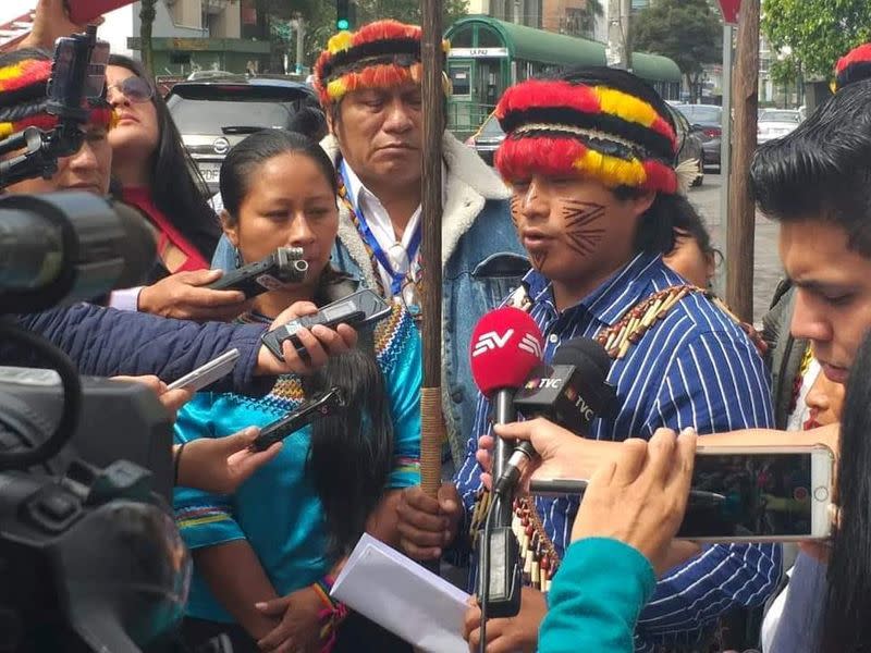 Representatives of the Shiwiar, Sapara and Kichwa indigenous communities gather to deliver a statement in Quito