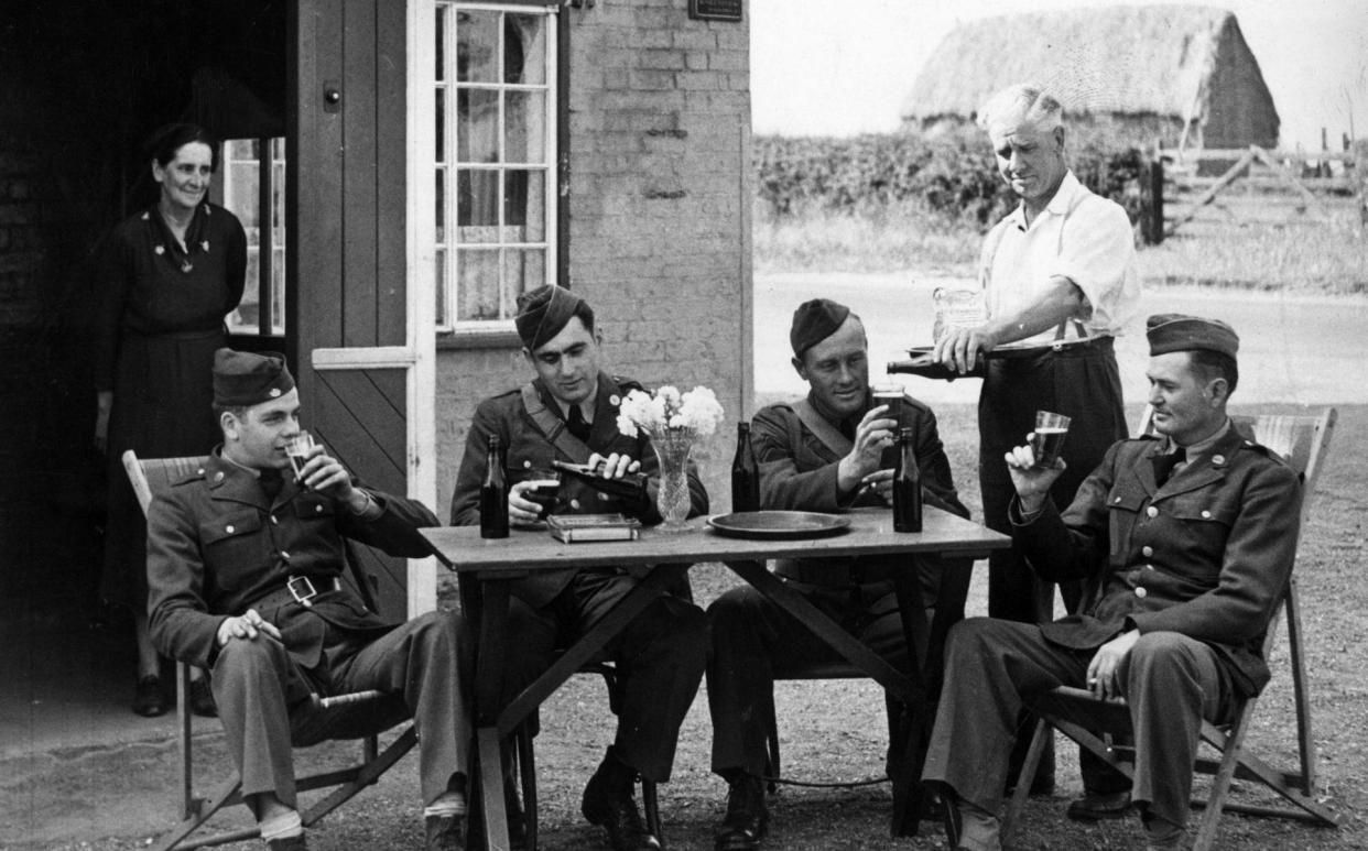 Subjugating the subjunctive: The first US troops in Britain enjoy a quiet beer outside the village pub (1942)