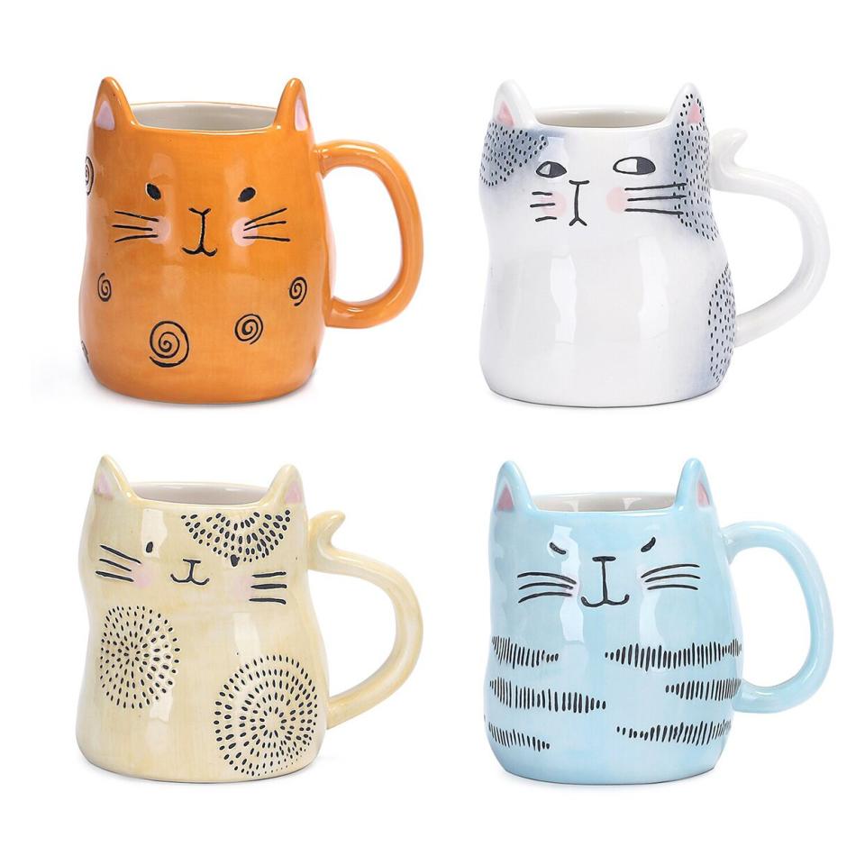 Product photo of a Cartoon Cat Four-Piece Mug Set on a white background