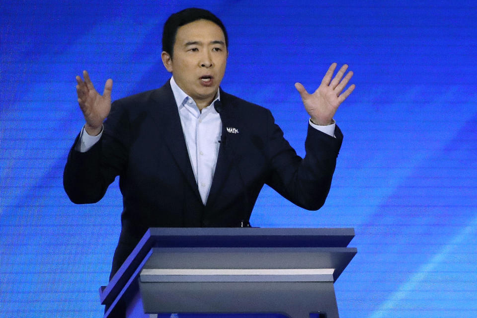 Democratic presidential candidate entrepreneur Andrew Yang speaks during a Democratic presidential primary debate, Friday, Feb. 7, 2020, hosted by ABC News, Apple News, and WMUR-TV at Saint Anselm College in Manchester, N.H. (AP Photo/Elise Amendola)