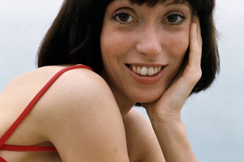 30th Cannes Film Festival 1977: Shelley Duvall. Le 30ème Festival de Cannes se déroule du 13 au 27 mai 1997 : attitude souriante de Shelley DUVALL une main sur la joue.