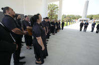 New Zealand's Prime Minister Christopher Luxon, second right, receives a haka waiata during a visit to National Cemetery in Seoul, South Korea, Wednesday, Sept. 4, 2024. (AP Photo/Ahn Young-joon)