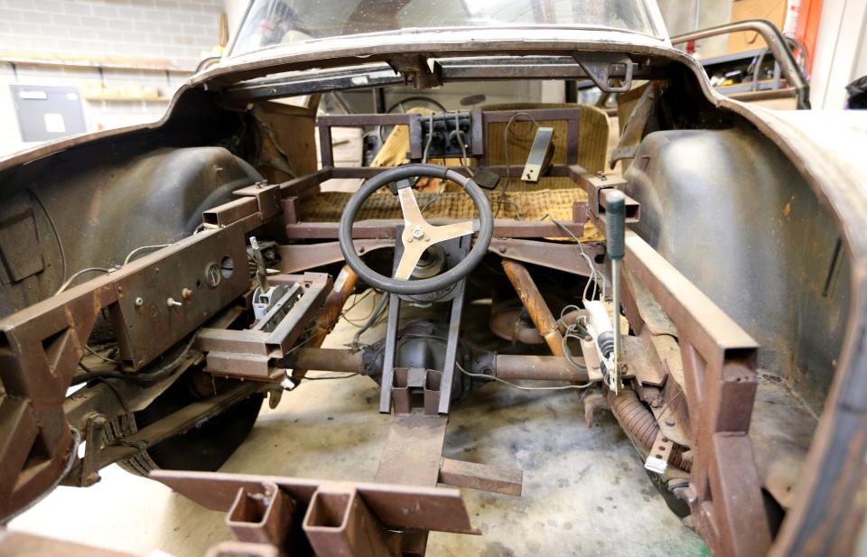 A very small person was hidden as he sat in this trunk compartment to drive the 1951 Studebaker Commander in the 1979 film "The Muppet Movie." The car is seen Friday, Jan. 12, 2024, at the Studebaker National Museum in South Bend, just before it shipped off to North Carolina for restoration.