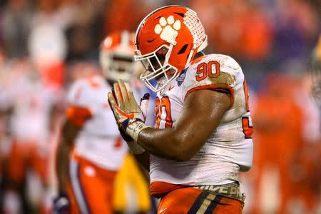 Dec 1, 2018; Charlotte, NC, USA; Clemson Tigers defensive tackle Dexter Lawrence (90) celebrates after a sack in the first quarter against the Pittsburgh Panthers in the ACC championship game at Bank of America Stadium. Mandatory Credit: Jeremy Brevard-USA TODAY Sports