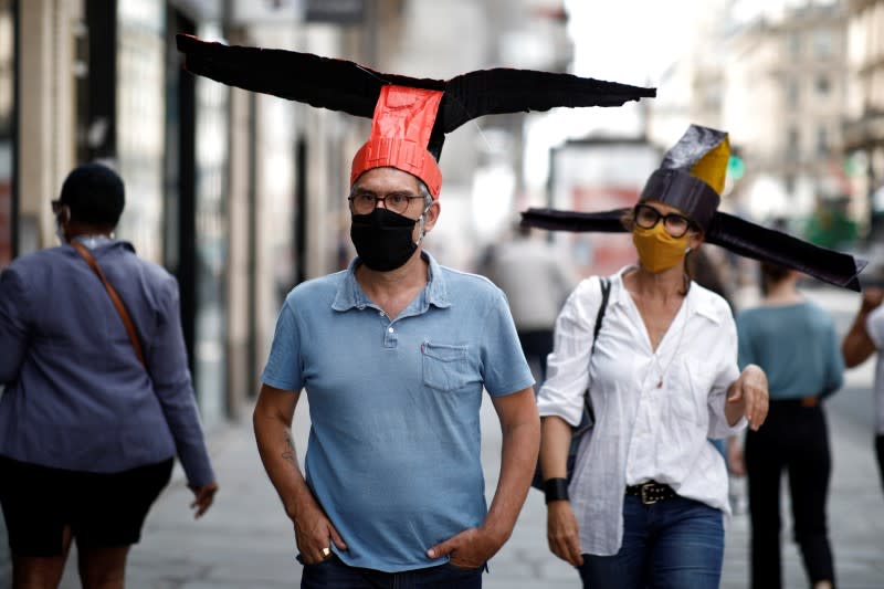 Paris gallery fashions 'deconfinement hats' as lockdown continues to ease nationwide