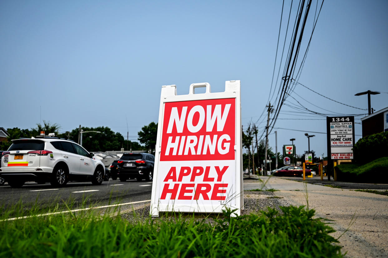 A hiring sign stands along the road in Selden, N.Y., on July 20, 2021. (Thomas A. Ferrara / Newsday via Getty Images file)