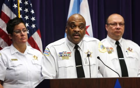 Chicago Police Superintendent Eddie Johnson, center, speaks about the charges against Andrew Warren and Wyndham Lathem  - Credit: AP