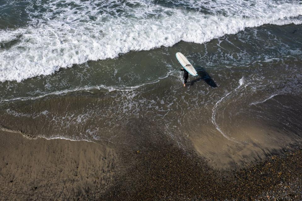 24) Perfect your wave riding at Tourmaline Surfing Park Beach.