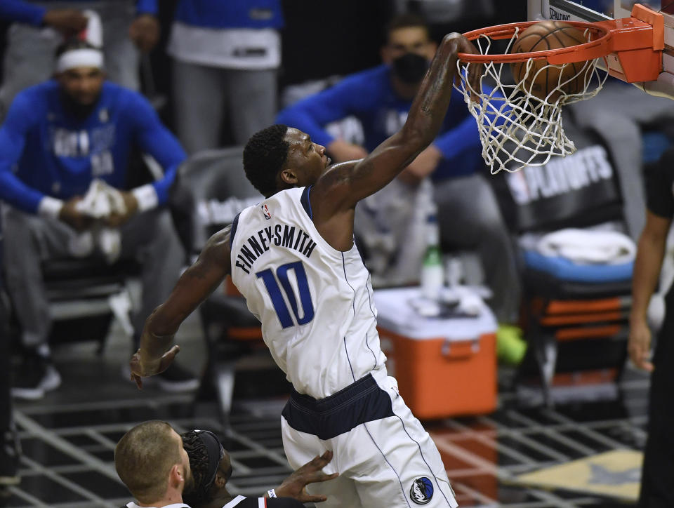 Dorian Finney-Smith #10 of the Dallas Mavericks dunks on the LA Clippers in the first quarter during game one of the Western Conference first round series at Staples Center on May 22, 2021 in Los Angeles, California. NOTE TO USER: User expressly acknowledges and agrees that, by downloading and or using this photograph, User is consenting to the terms and conditions of the Getty Images License Agreement. (Photo by Harry How/Getty Images)