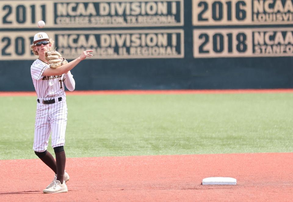 Roger Bacon junior infielder Anthony Hoffmann throws toward third in the Division III regional semifinal game with Reading June 2.