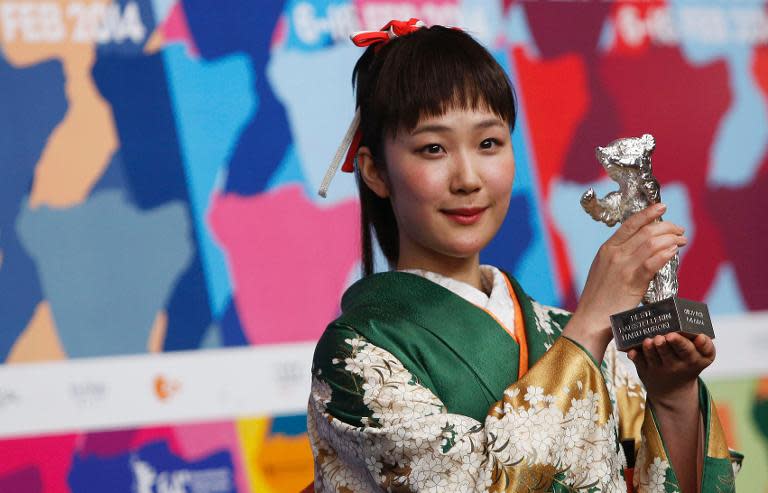 Actress Haru Kuroki pictured with her Silver Bear award for Best Actress at the Berlin film festival on February 15, 2014