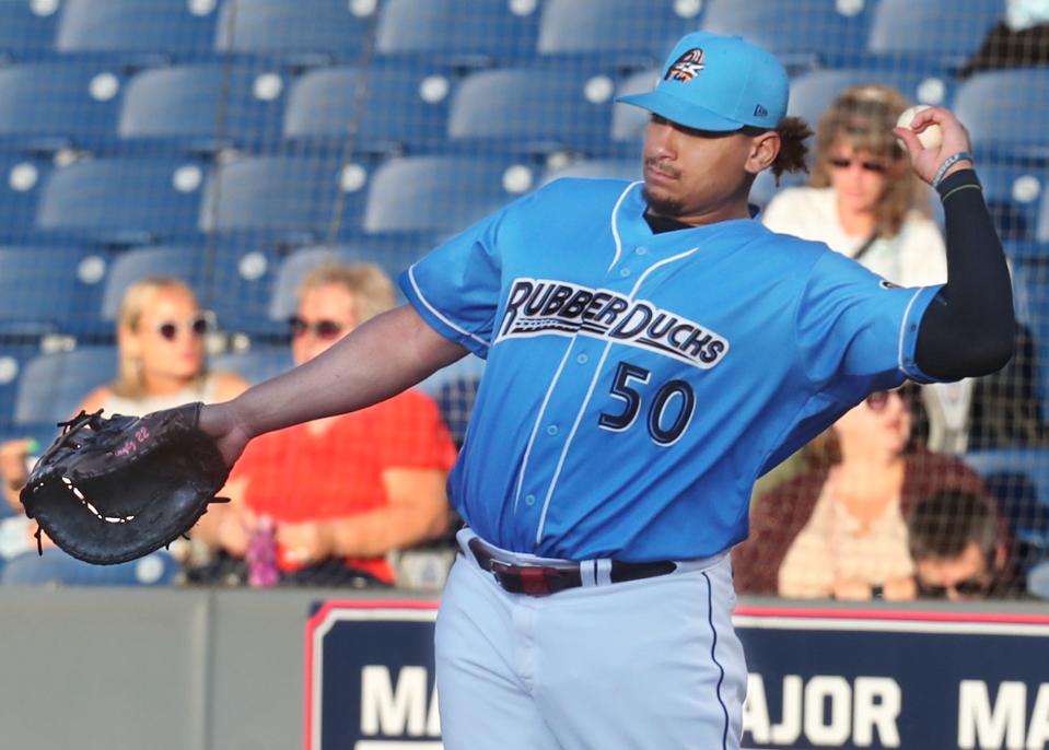 Guardians first baseman Josh Naylor, on a rehab assignment with the RubberDucks, throws to second as he warms up during a game against the Bowie Baysox at Canal Park on Thursday.