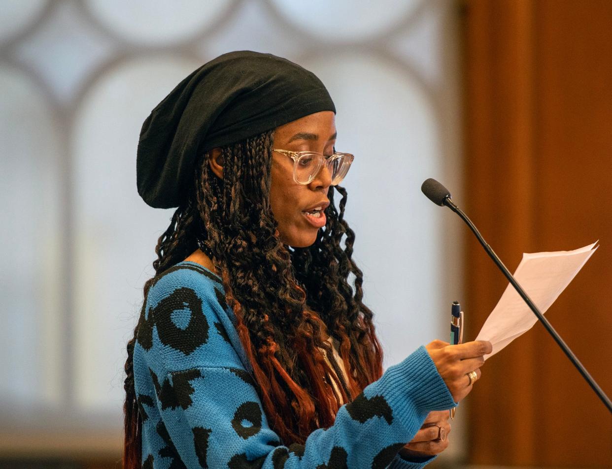 Aaliyah Hazard reads a statement during a meeting of the city’s Affordable Housing Trust Fund’s Board of Trustees in City Hall Wednesday.