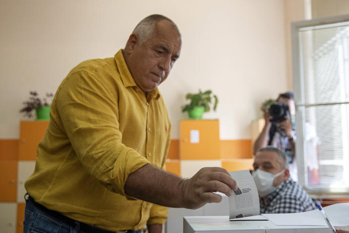 Bulgarian former prime minister Boyko Borissov casts his vote during parliamentary elections in the town of Bankya near capital Sofia, Bulgaria on Sunday, July 11, 2021. Bulgarians are voting in a snap poll on Sunday after a previous election in April produced a fragmented parliament that failed to form a viable coalition government. Latest opinion polls suggest that the rerun could produce similar results but also a further drop in support for former Prime Minister Boyko Borissov's GERB party, after the current caretaker government made public allegations of widespread corruption during his rule. (AP PHOTO/Visar Kryeziu)