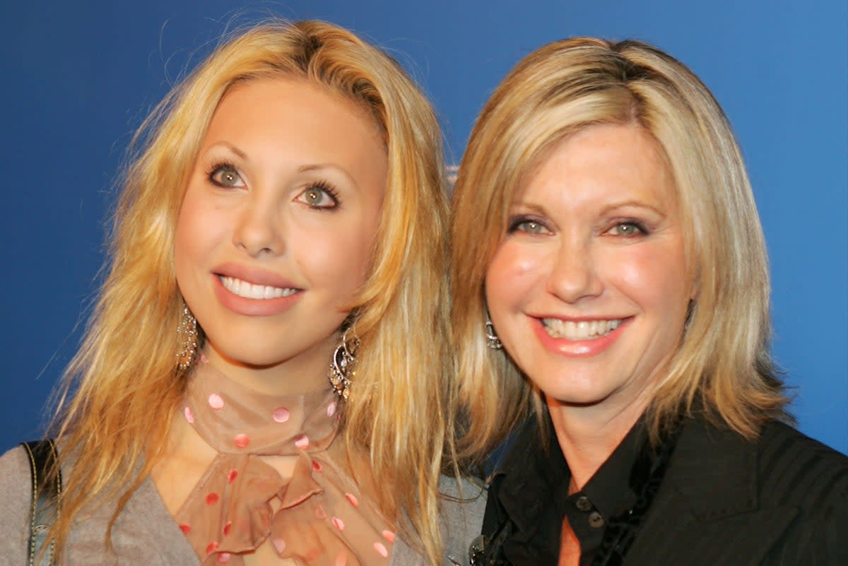Olivia Newton John (R) and her daughter Chloe Lattanzi arrives at Grammy Jams' celebration of Stevie Wonder at the Orpheum Theater in December (Kevin Winter/Getty Images)