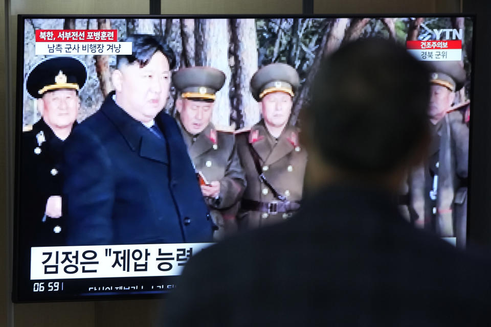 A TV screen shows an image of North Korean leader Kim Jong Un during a news program at the Seoul Railway Station in Seoul, South Korea, Friday, March 10, 2023. North Korean leader Kim Jong Un supervised a frontline artillery drill simulating an attack on an unspecified South Korean airfield as he called for his troops to sharpen their combat readiness in the face of his rivals' "frantic war preparation moves," state media said Friday. (AP Photo/Ahn Young-joon)