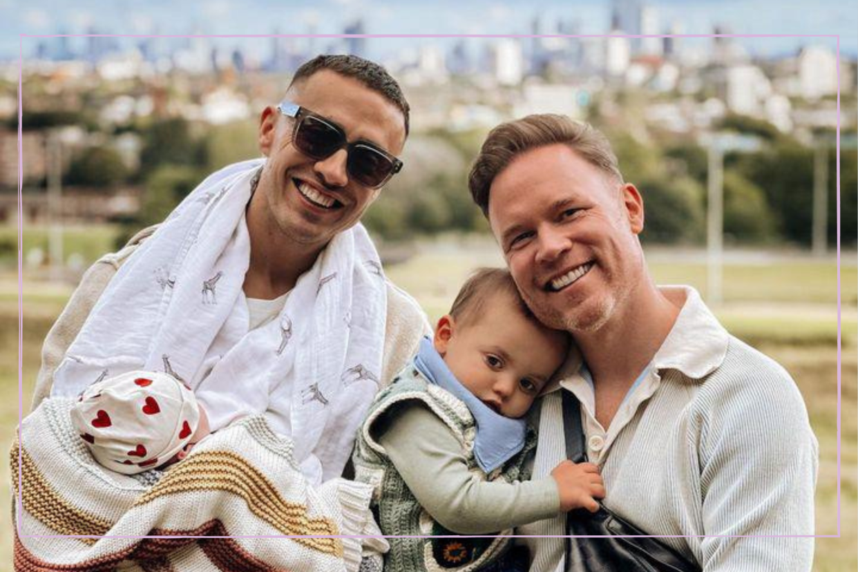  Francis Haugen (left) holding newborn Rebel and Stuart Armfield (right) holding son, Rio. 