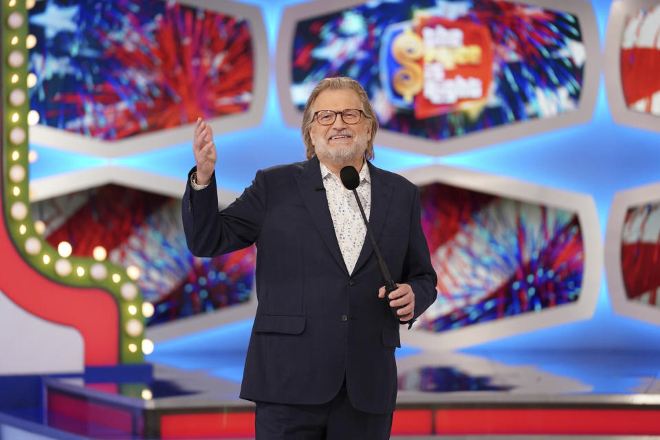 This image released by CBS Entertainment shows host Drew Carey from "The Price is Right." Carey replaced Bob Barker on “The Price is Right” in 2007. (Sonja Flemming/CBS Entertainment via AP)