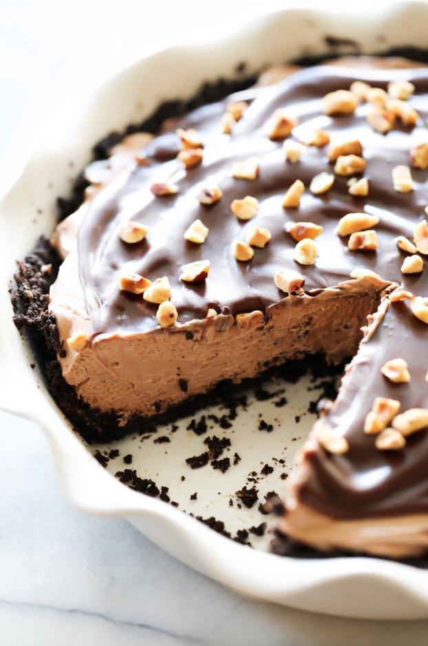 <p>Yep, that's a homemade Oreo crust! Add toasted hazelnuts as a garnish for an <a rel="nofollow noopener" href="https://www.womansday.com/food-recipes/food-drinks/g2202/10-irresistible-easter-cakes/" target="_blank" data-ylk="slk:over-the-top dessert;elm:context_link;itc:0;sec:content-canvas" class="link ">over-the-top dessert</a> everyone will love.</p><p><strong>Get the recipe at <a rel="nofollow noopener" href="http://www.chef-in-training.com/2017/01/chocolate-hazelnut-cream-pie/" target="_blank" data-ylk="slk:Chef in Training;elm:context_link;itc:0;sec:content-canvas" class="link ">Chef in Training</a>. </strong></p>