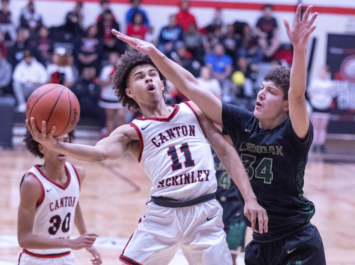 McKinley's Davey Thompson, driving to the basket against GlenOak in January, scored 14 points Saturday.