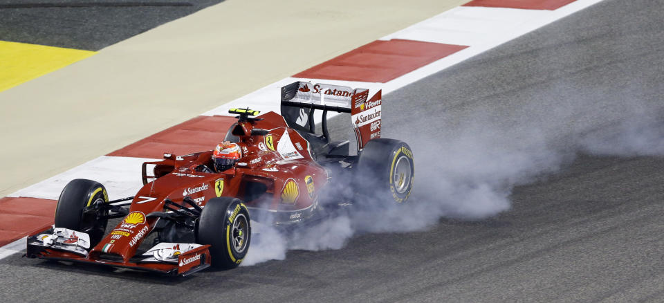 Ferrari driver Kimi Raikkonen of Finland brakes during the Bahrain Formula One Grand Prix at the Bahrain International Circuit in Sakhir, Bahrain, Sunday, April 6, 2014. (AP Photo/Luca Bruno)