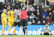 <p>Newcastle’s DeAndre Yedlin was sent off by referee Mike Dean as Wolves won 2-1 at St James’ Park (Owen Humphreys/PA) </p>