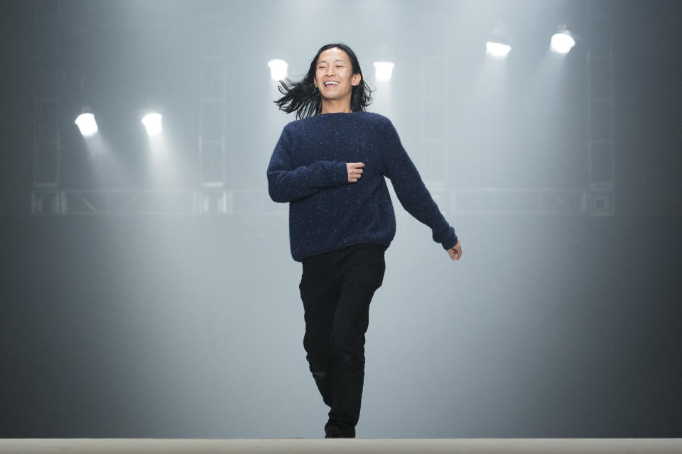 FILE - This Feb. 9, 2013 file photo shows designer Alexander Wang greeting the audience following his Fall 2013 fashion show during Fashion Week in New York. (AP Photo/John Minchillo, File)